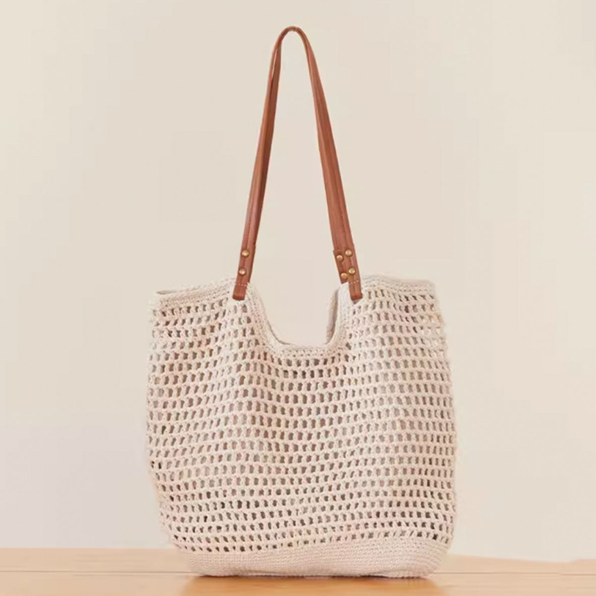 Crochet bag with leather strap